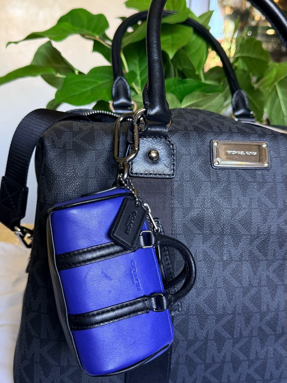 Coach Black Duffel with Blue Mini Bag Charm